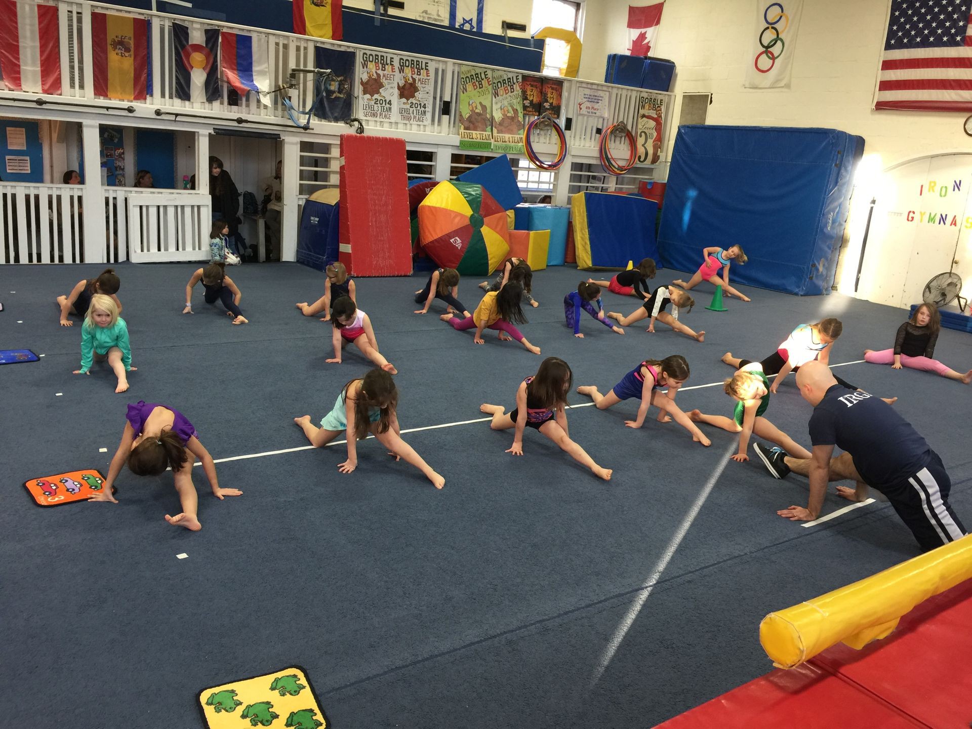 Beginner gymnastics team stretching